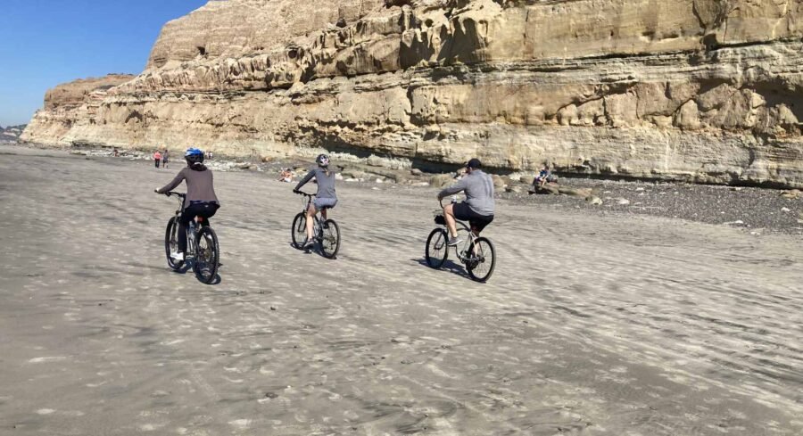 bike riding on the beach