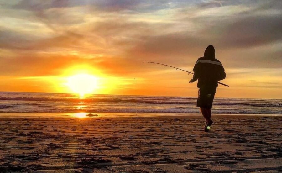 sunset surf fishing in the evening